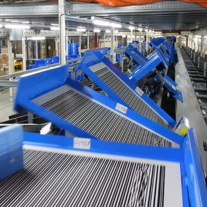 sistema de clasificación con bandeja basculante