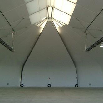 Puerta de hangar corredera - SPRUNG STRUCTURES LTD. - automática / de tejido