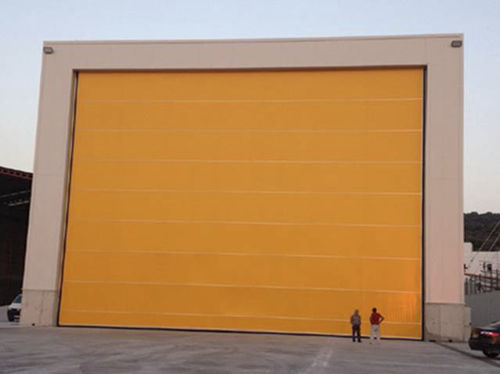 Puerta de hangar corredera - PUERTA HANGAR DE LONA - DOOR KING DE MEXICO, S.A. DE C.V. - para avión / automática
