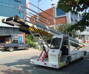 tapis à bagages autotracté