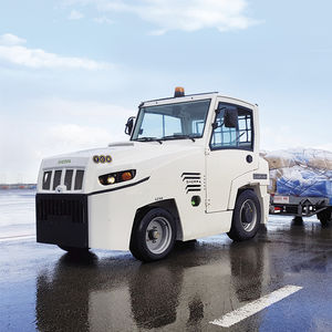 tracteur de remorquage / avec barre de remorquage / pour chariot à bagages / avec cabine