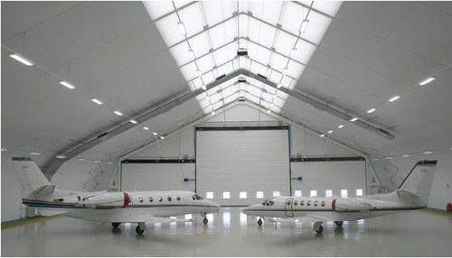 Porte de hangar sectionnelle - SPRUNG STRUCTURES LTD. - automatique
