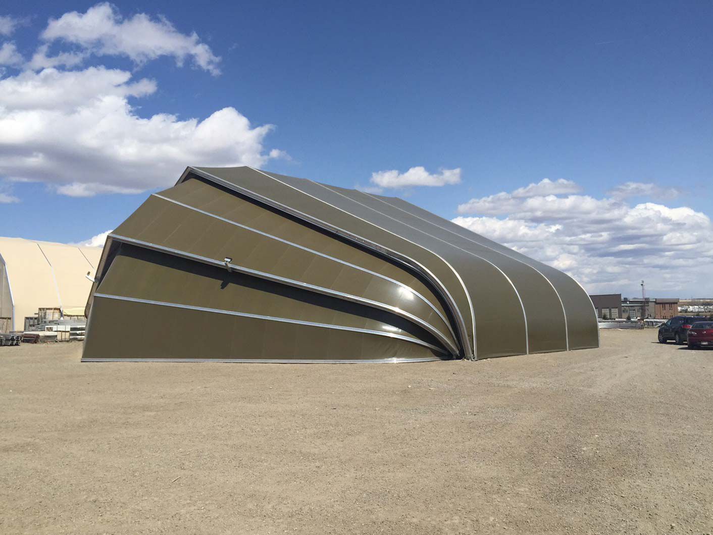 Folding hangar door Armadillo SPRUNG STRUCTURES LTD.