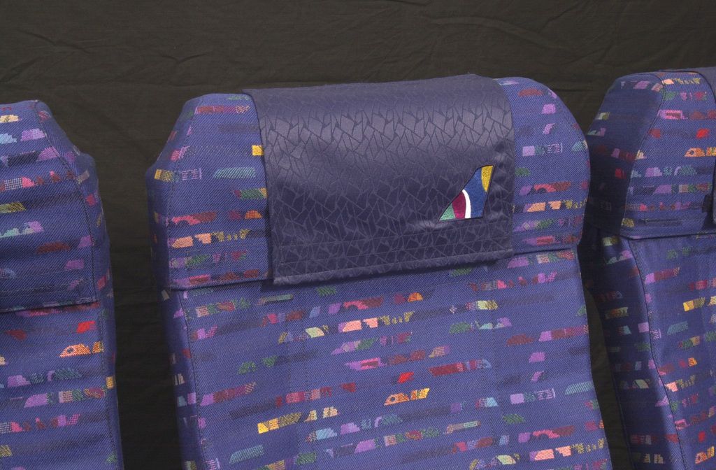 Aircraft cabin headrest cover Mills Textiles