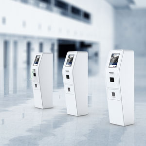 check-in kiosk with boarding pass reader
