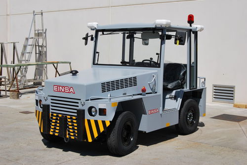 Towing tractor - TA-5 - EINSA - EQUIPOS INDUSTRIALES DE MANUTENCIÓN - for aircraft / with towbar / with cab