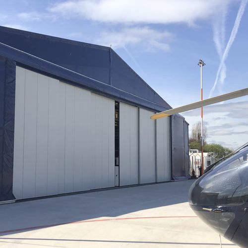 Porta per hangar industriale - Kingfisher  - JEWERS DOORS - scorrevole / per aereo