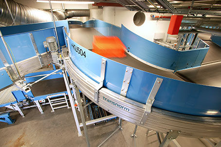 Trasportatore a strisce - TRANSNORM SYSTEM GMBH - portabagagli / modulare / per aeroporto