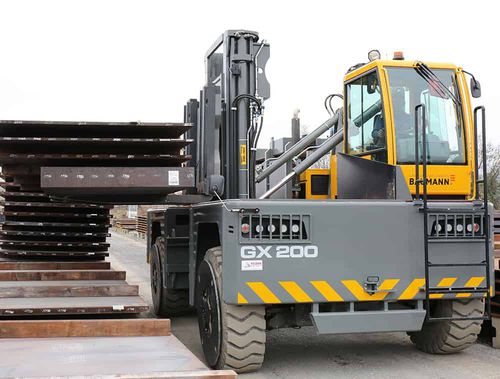 Carrello elevatore diesel - GX series - Baumann Srl - elettrico / con conducente seduto / 4 ruote