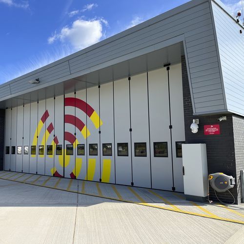 Porta para hangar industrial - Osprey  - JEWERS DOORS - de correr / dobrável / para helicóptero