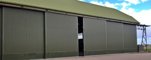 Porta de correr para hangar - Samurai  - JEWERS DOORS - dobrável / para avião / resistente ao vento