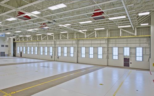 Porta de correr para hangar - F-22 - Norco Mfg